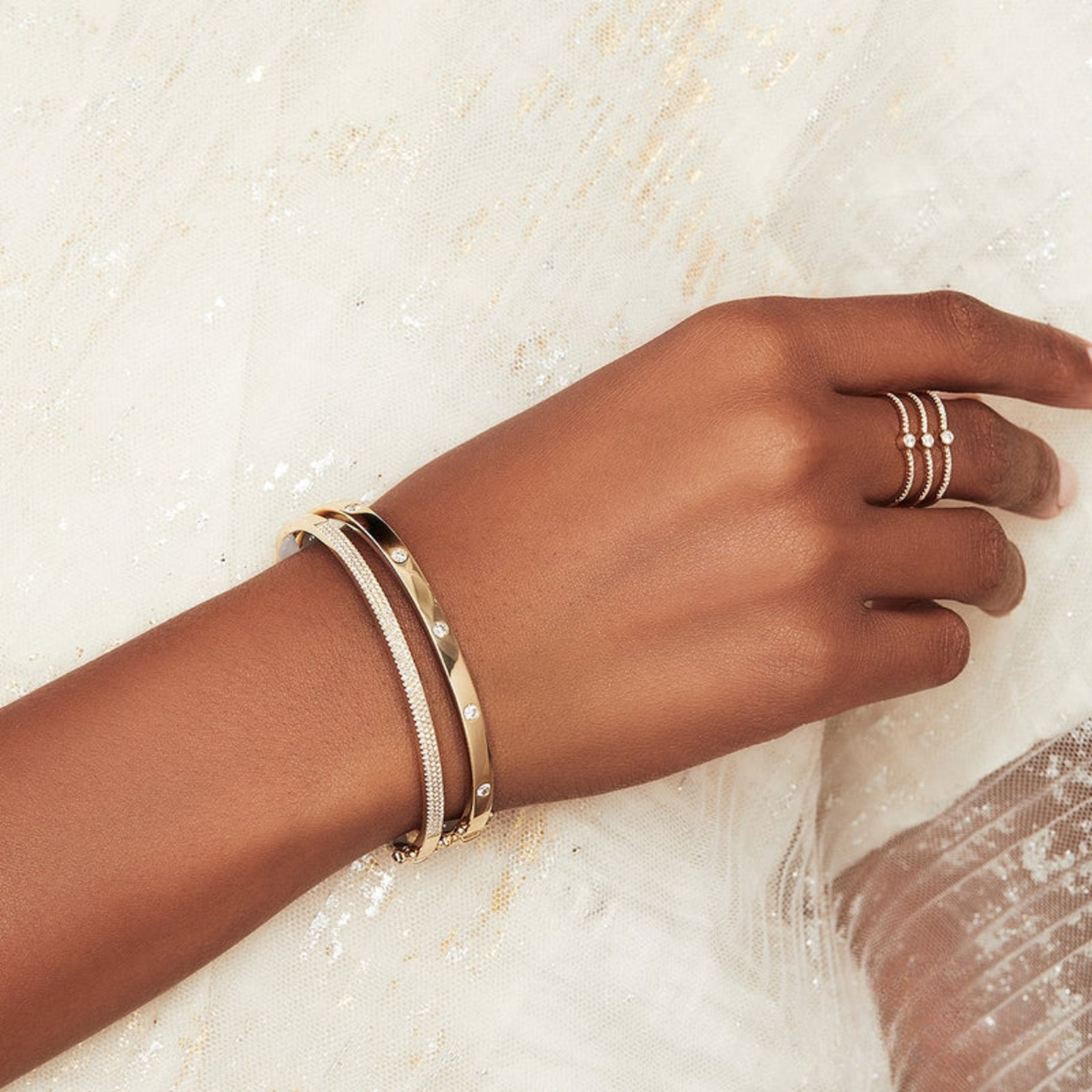 14K Gold Flush Set Diamond Bangle Bracelet Worn on Wrist