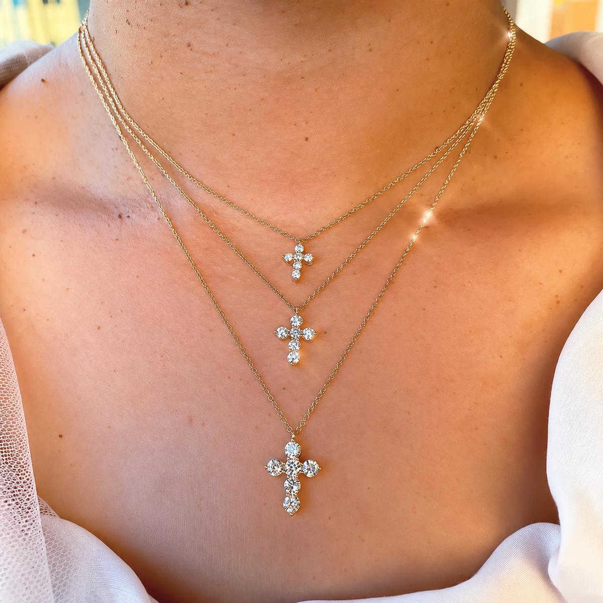 14K Gold Six Stone Diamond Cross Necklace Worn on Neck