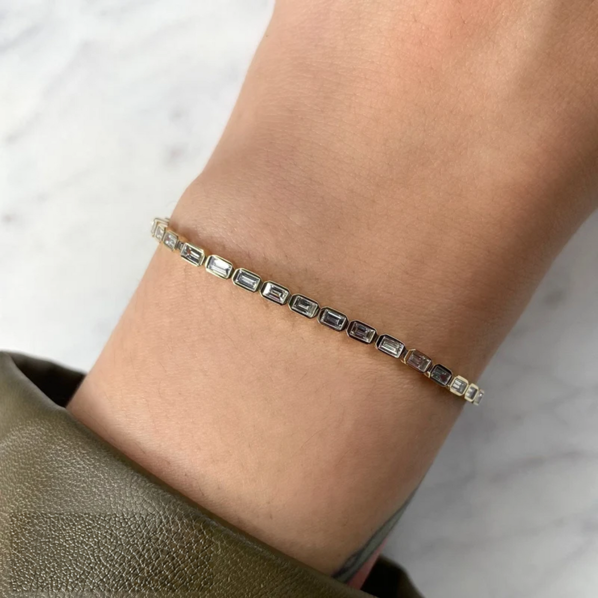 14K Gold East-West Baguette Bezel Tennis Bracelet Worn on Wrist