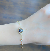 Load image into Gallery viewer, 14Kt Yellow Gold Eye Bracelet with Diamonds and Blue Sapphire
