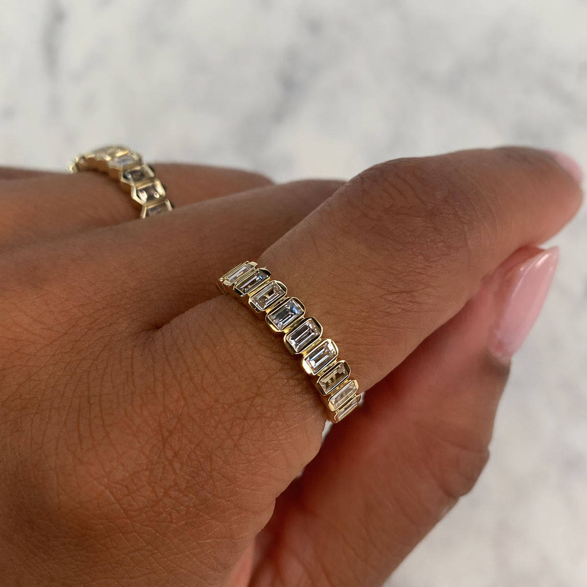 14K Gold Baguette Bezel Band Worn on Finger