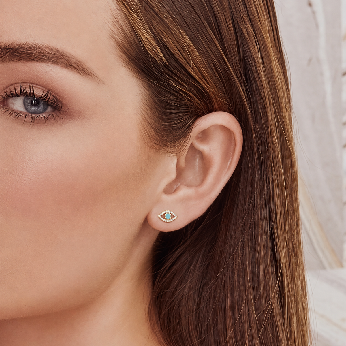 14K Gold Turquoise Eye Stud Earrings Worn on Ear