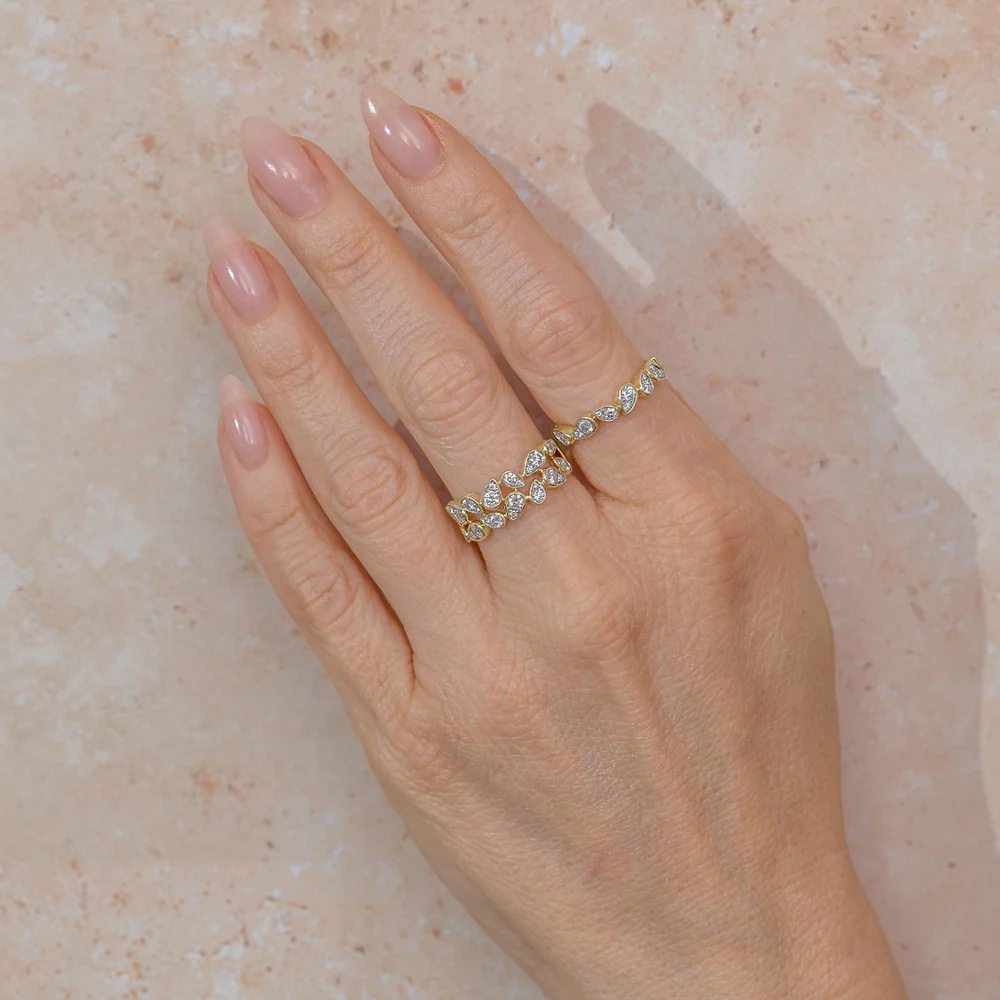14K Gold Diamond Pear Ring Worn on Finger