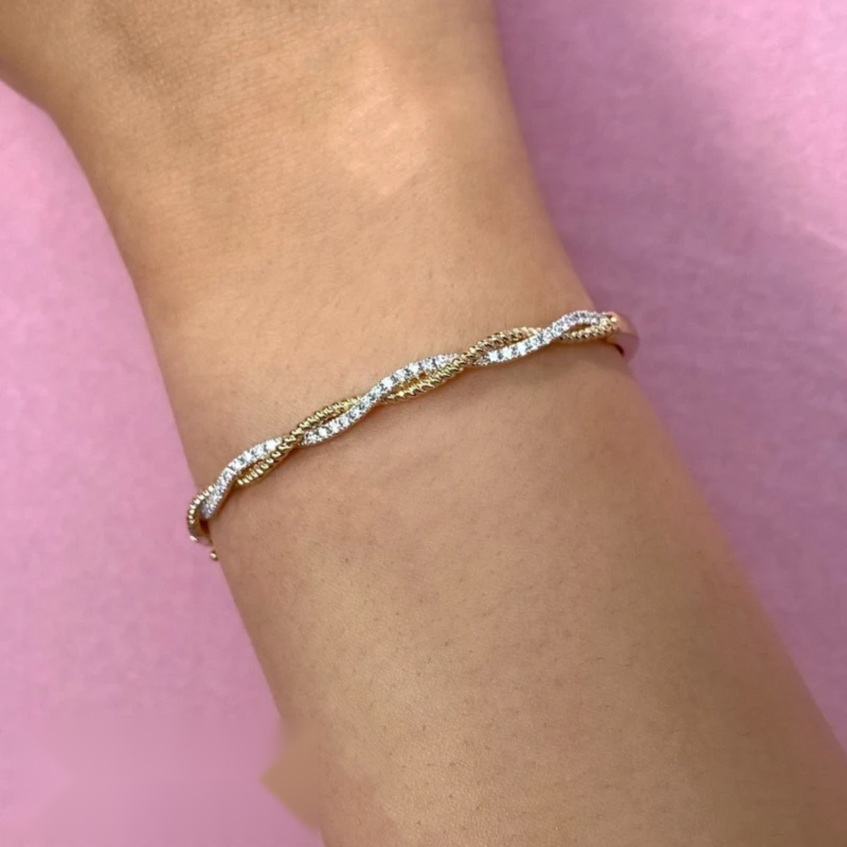 14K Gold Diamond Twisted Bangle Bracelet Worn on Wrist