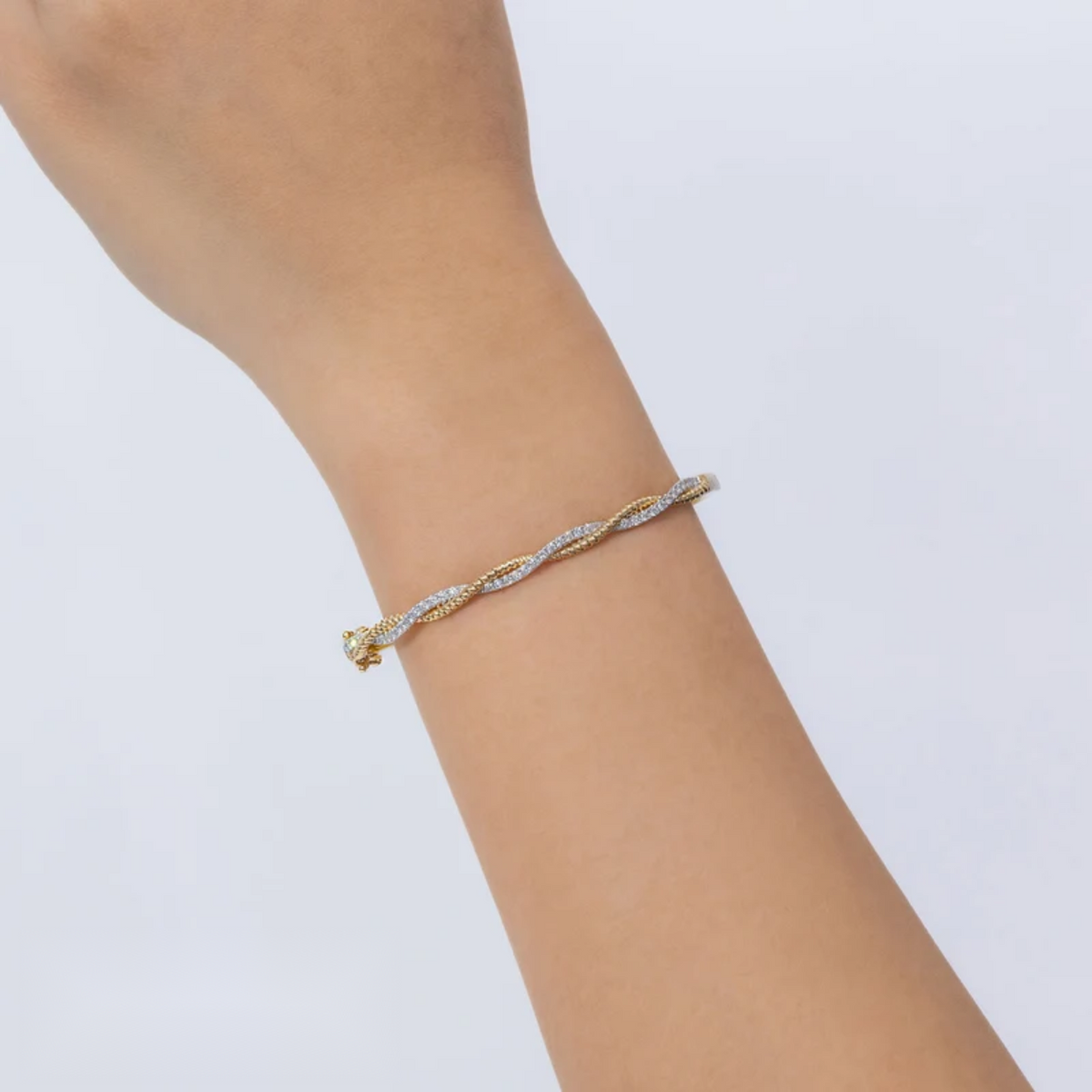 14K Gold Diamond Twisted Bangle Bracelet Worn on Wrist