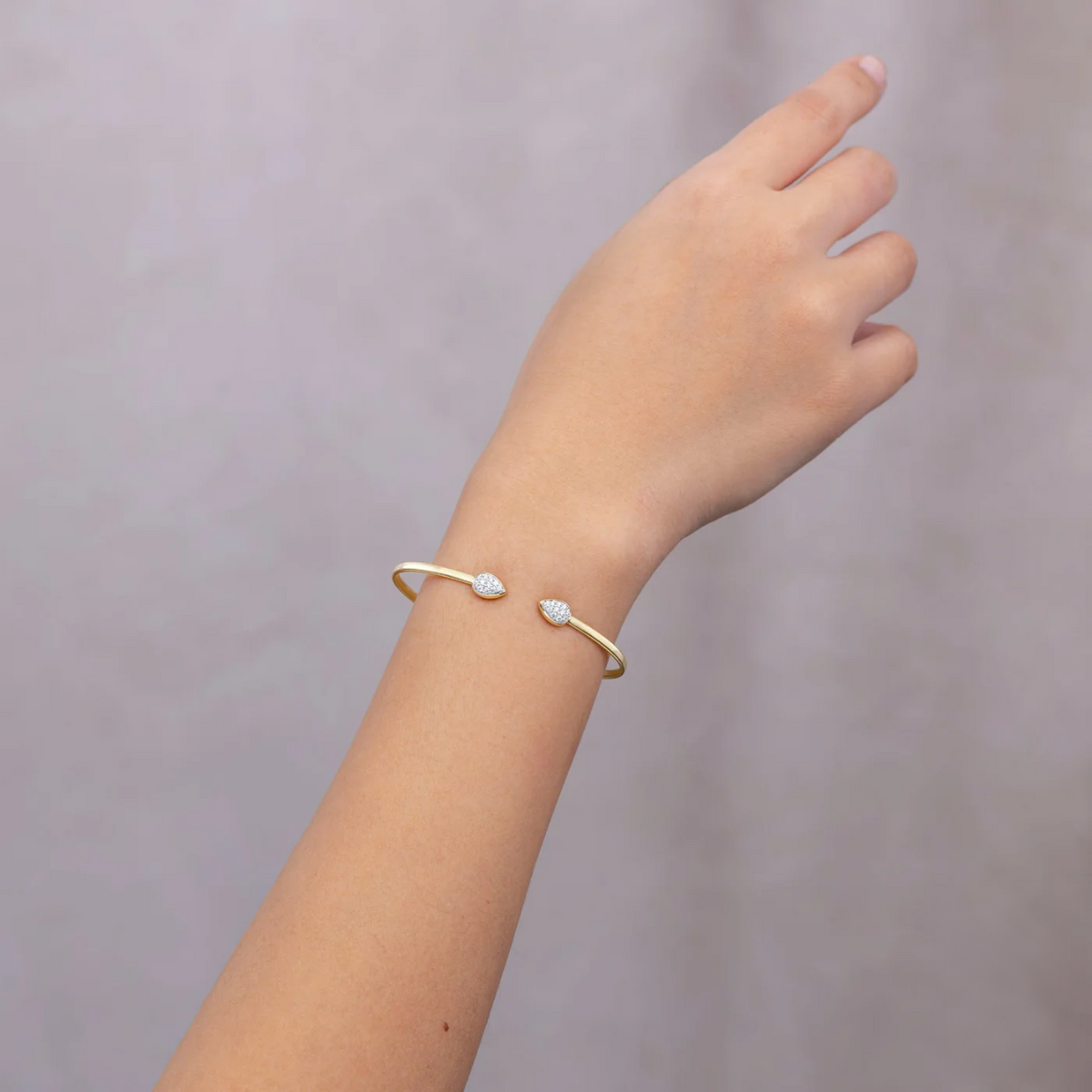 14K Gold Double Pear Diamond Open Bangle Bracelet Worn on Wrist