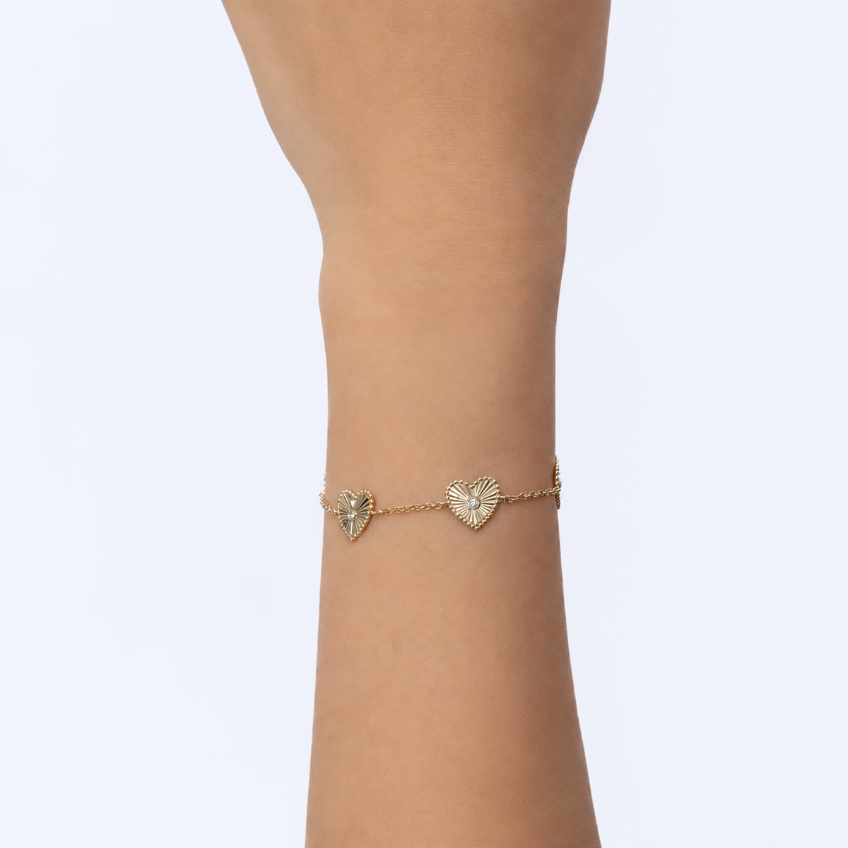 14K Gold Diamond Ribbed Heart Bracelet Worn on Wrist