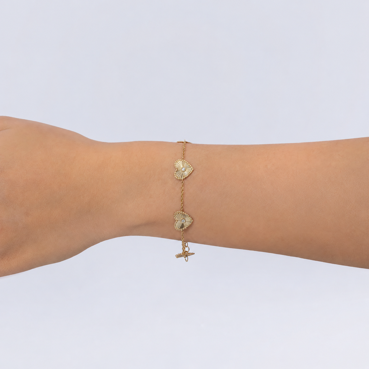 14K Gold Diamond Ribbed Heart Bracelet Worn on Wrist