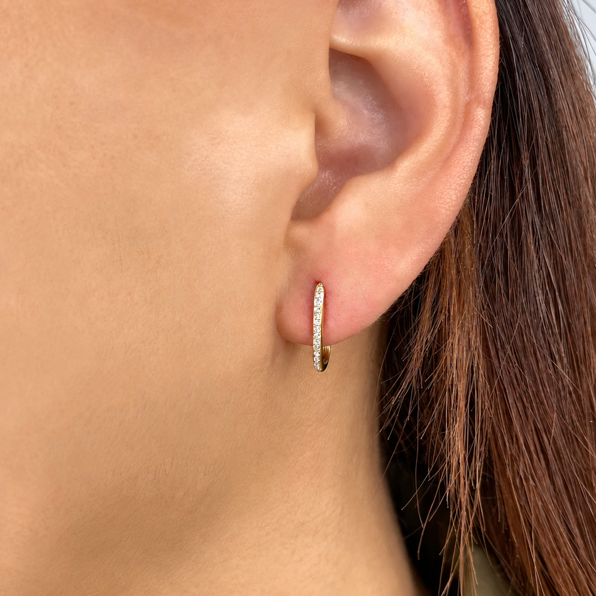 14K Gold Diamond Oval Hoop Earring Worn on Ear