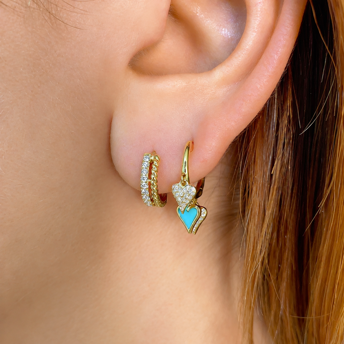 14K Gold Diamond Twist Huggie Earrings Worn on Ear
