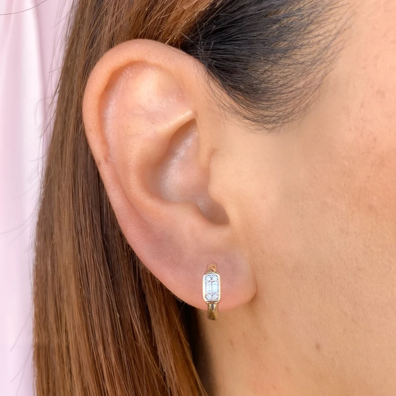 14K Gold Baguette Diamond Cluster Huggie Earrings Worn on Ear